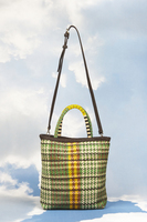 Woven and perforated leather bag with beaded handles  image