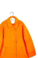 Orange faux fur coat  image