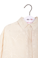 Ivory floral emboidered shirt with tassles image