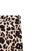 Beige leopard print trousers image