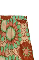 Pantaloni in voile con stampa floreale color mela e terracotta image
