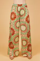 Apple and terracotta floral print voile trousers  image