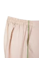 Pantaloni beige con spacchi laterali image