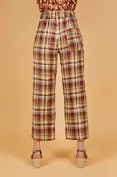 Brown and burgundy plaid trousers  image