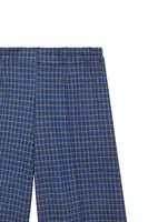 Pantaloni in jersey jacquard a quadri sottili blu reale image